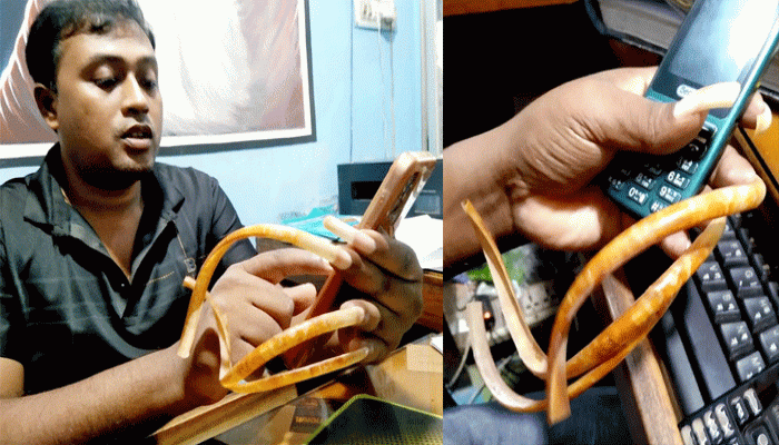 ৩৩ বছরের অনন্য শখ! ফুলবাড়ীর অরুণ কুমারের বাম হাতের নখ ১৫ ইঞ্চি!